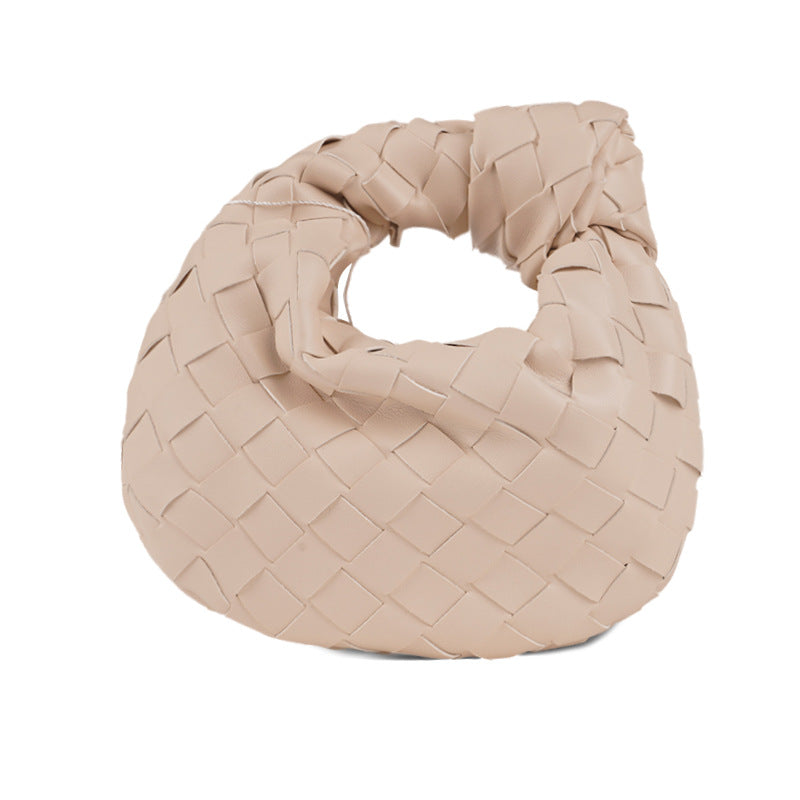 Borsa a mezzaluna intrecciata Luna - borsa in pelle intrecciata di lusso con bottoni -mano | Becker Amsterdam