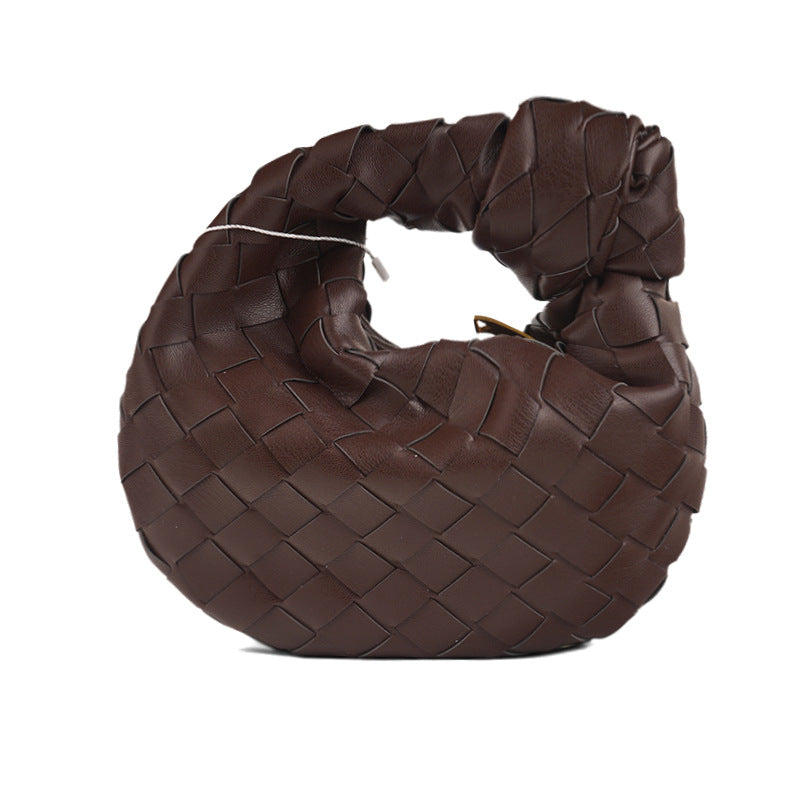 Borsa a mezzaluna intrecciata Luna - borsa in pelle intrecciata di lusso con bottoni -mano | Becker Amsterdam