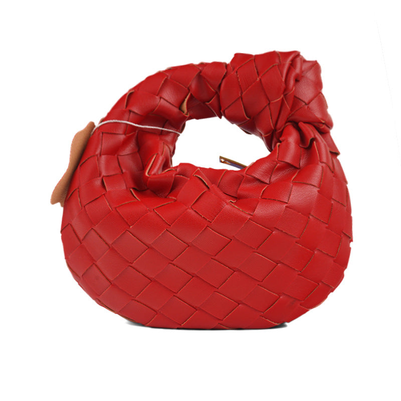 Borsa a mezzaluna intrecciata Luna - borsa in pelle intrecciata di lusso con bottoni -mano | Becker Amsterdam