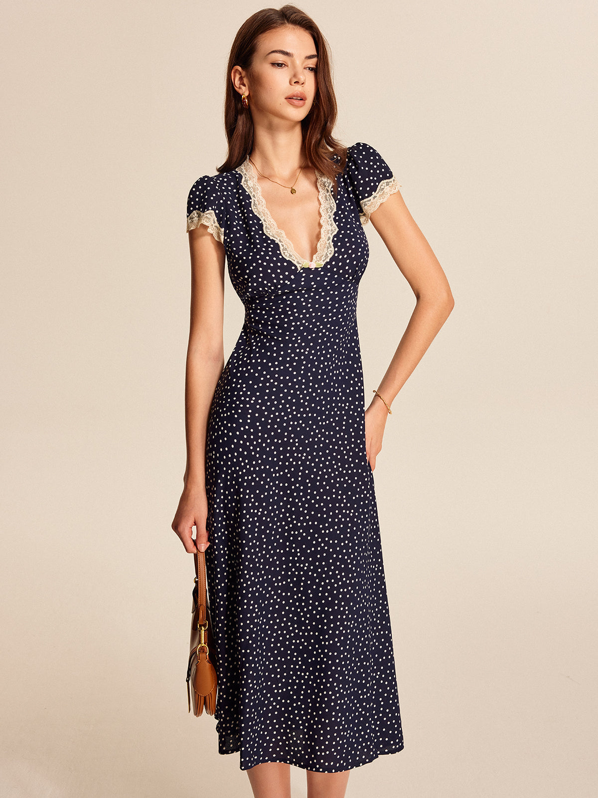 Abito midi Myna blu navy – Abito elegante con pois bianchi, pizzo e maniche a sbuffo | L'Amsterdam di Becker