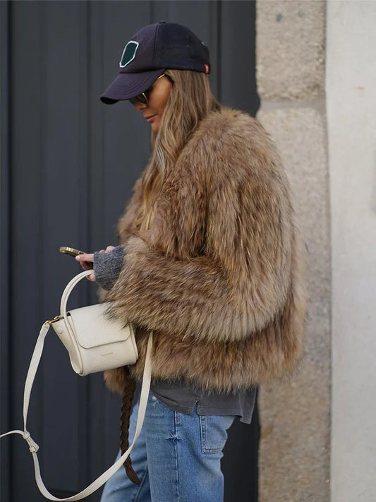 Nuvia Faux Fur Coat | Becker’s Amsterdam™ – zijaanzicht met elegante revers
