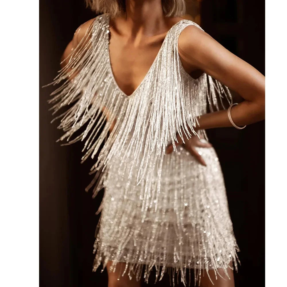 Zafira Glamour Cocktail Dress – Lyxiga fjädrar & fransar Detaljer | Beckers Amsterdam