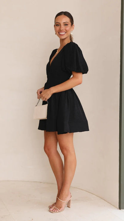 Macy Flare Mini Vestido - Vestido de verano con mangas hinchadas y cuello cuadrado | Amsterdam de Becker