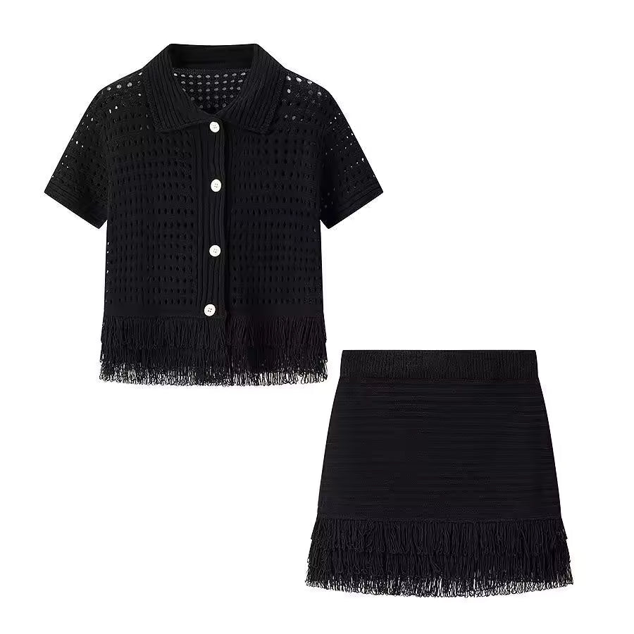 Lyna zwarte crochet co-ord set met top, minirok en franjes voor een elegante zomerse resort look van Becker's Amsterdam