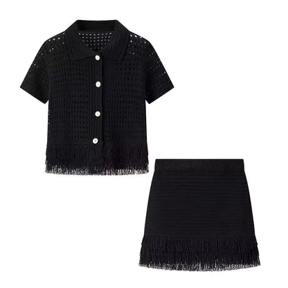 Lyna zwarte crochet co-ord set met top, minirok en franjes voor een elegante zomerse resort look van Becker's Amsterdam