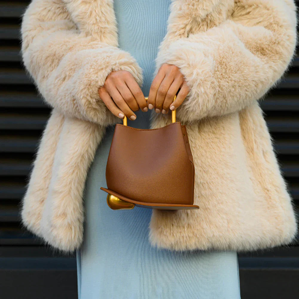 Rivelle Handbag | Becker’s Amsterdam™ – styled outfit met luxe Rivelle tas